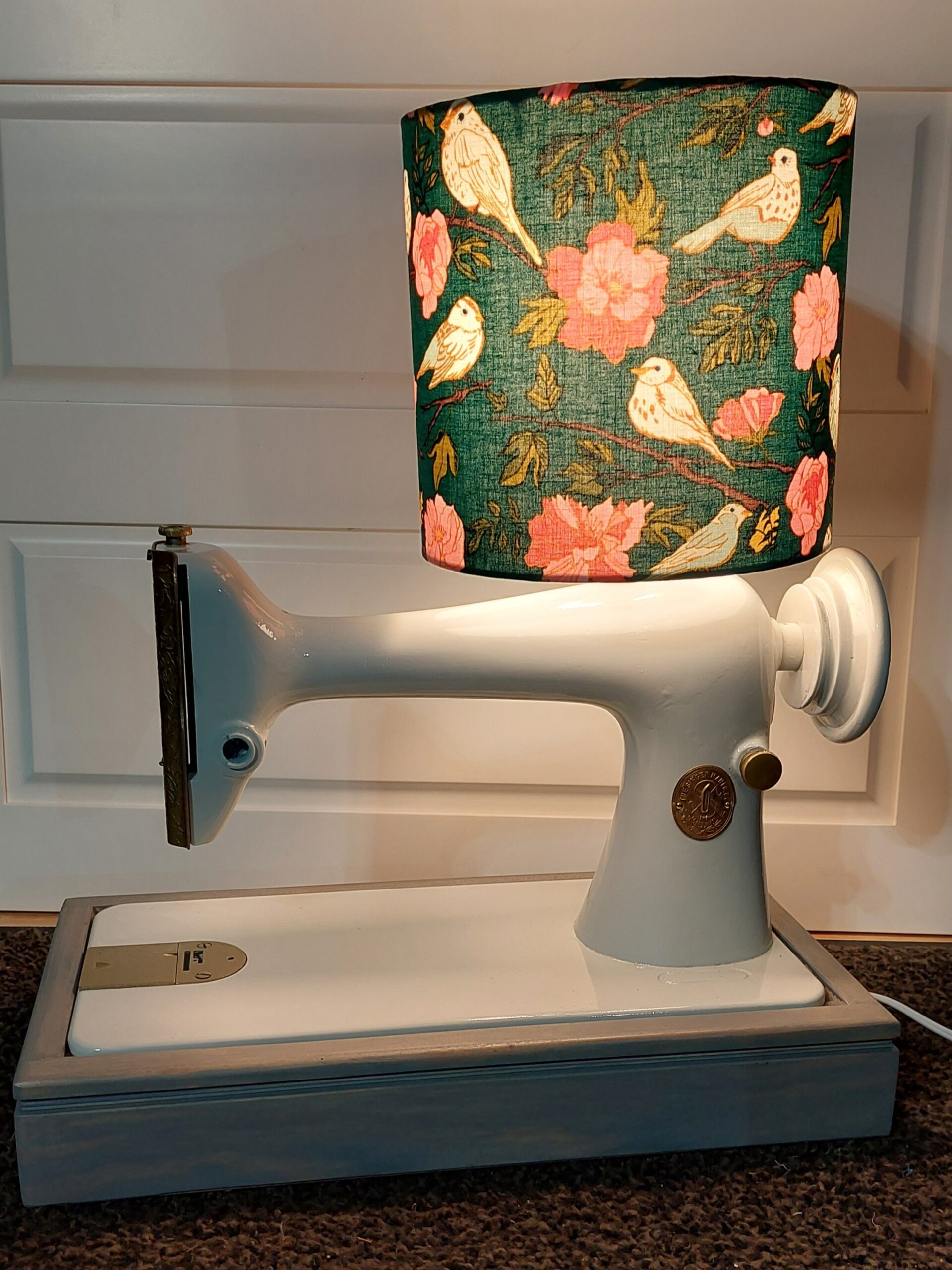 Custom sewing machine lamp painted white with floral shade